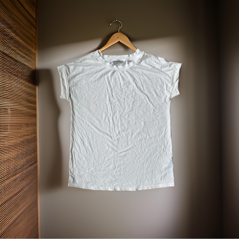 All Saints white shirt with folded sleeves.